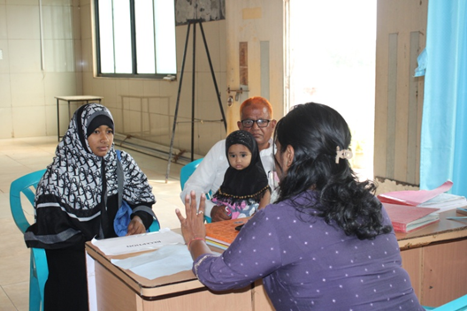 Doctor attending to a patient in a clinic setting